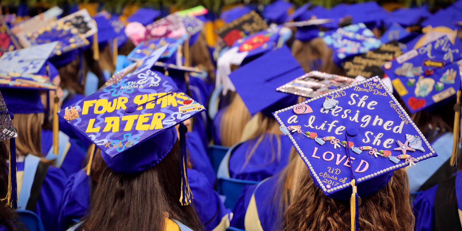 Decorated graduation caps at convocation ceremony