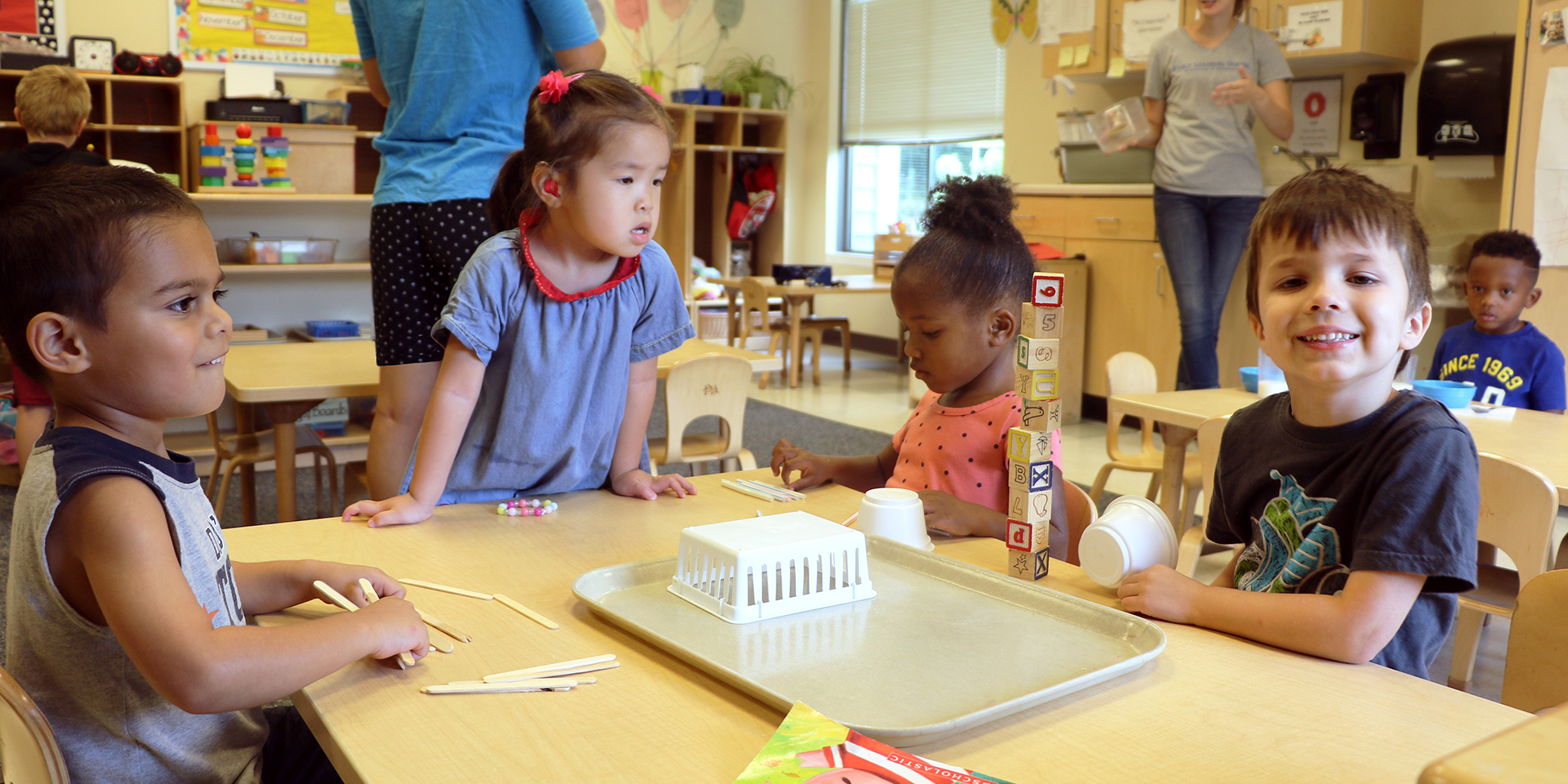 Four preschool children at the Early Learning Center