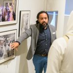 UD Prof. Roderick Carey speaks to a group of black and Latino boys at the Delaware Art Museum