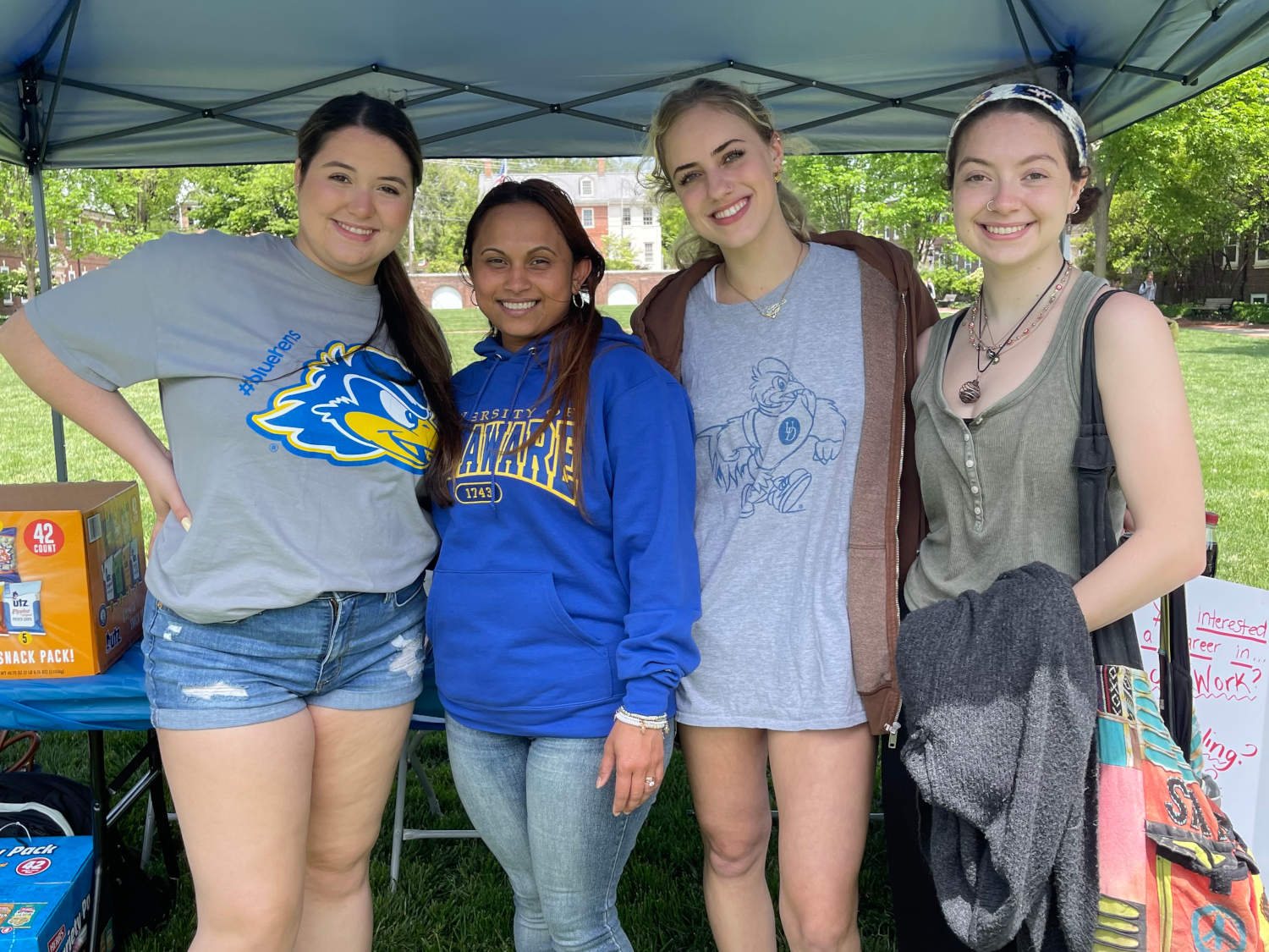 Students under tent at TUA event