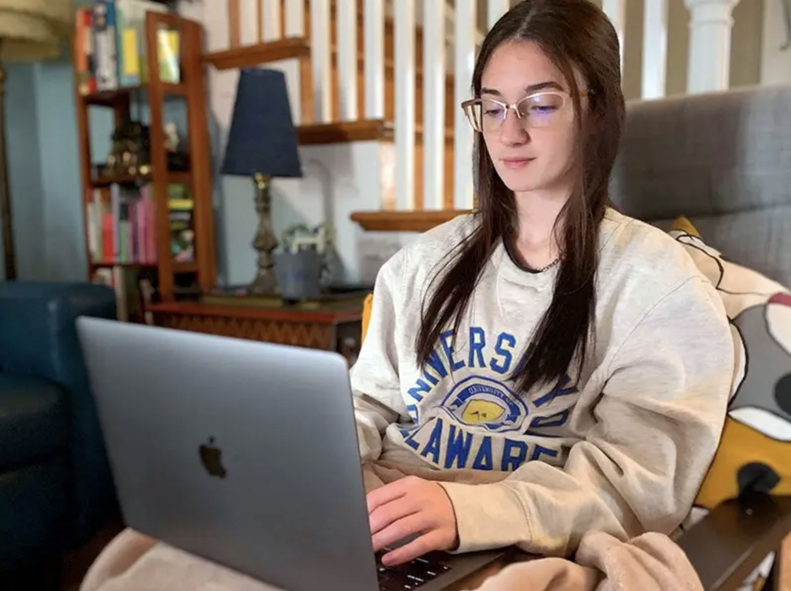 girl on her computer studying