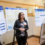 graduate student presents research to faculty at steele symposium
